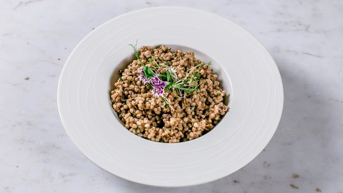 Fresh buckwheat with porcini and herbs