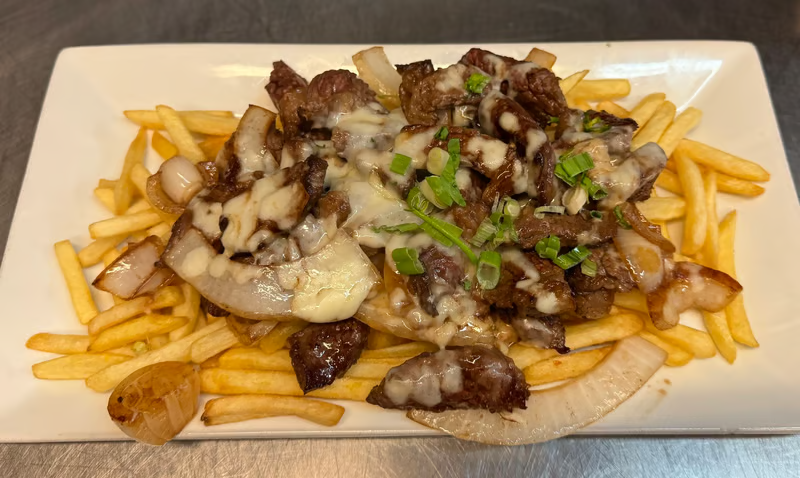 Picanha Acebolada Com Queijo, Batata-Frita / French Fries Topped with Sirloin Steak, Cheese, and Caramelized Onions