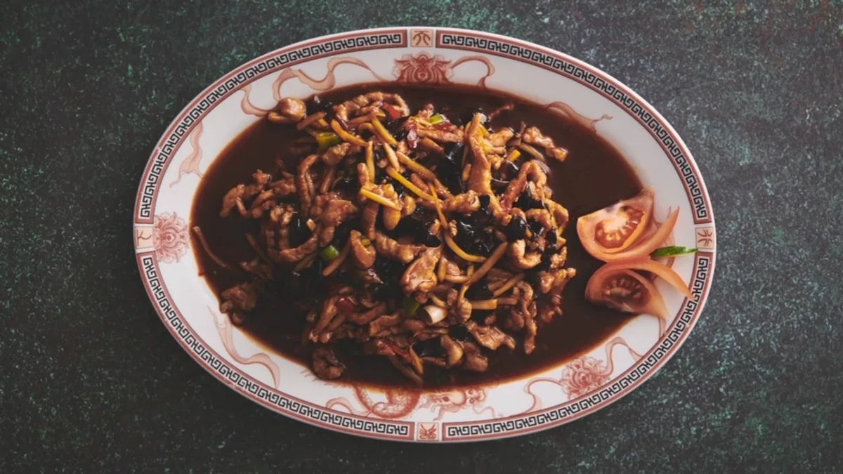 七十三 Stegte svinekødsstrimler med soyabønne sauce