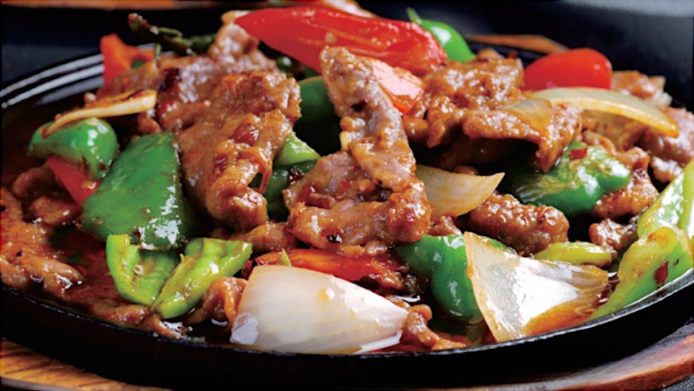 Beef Steak Served on a Sizzing Iron Plate 铁板牛肉
