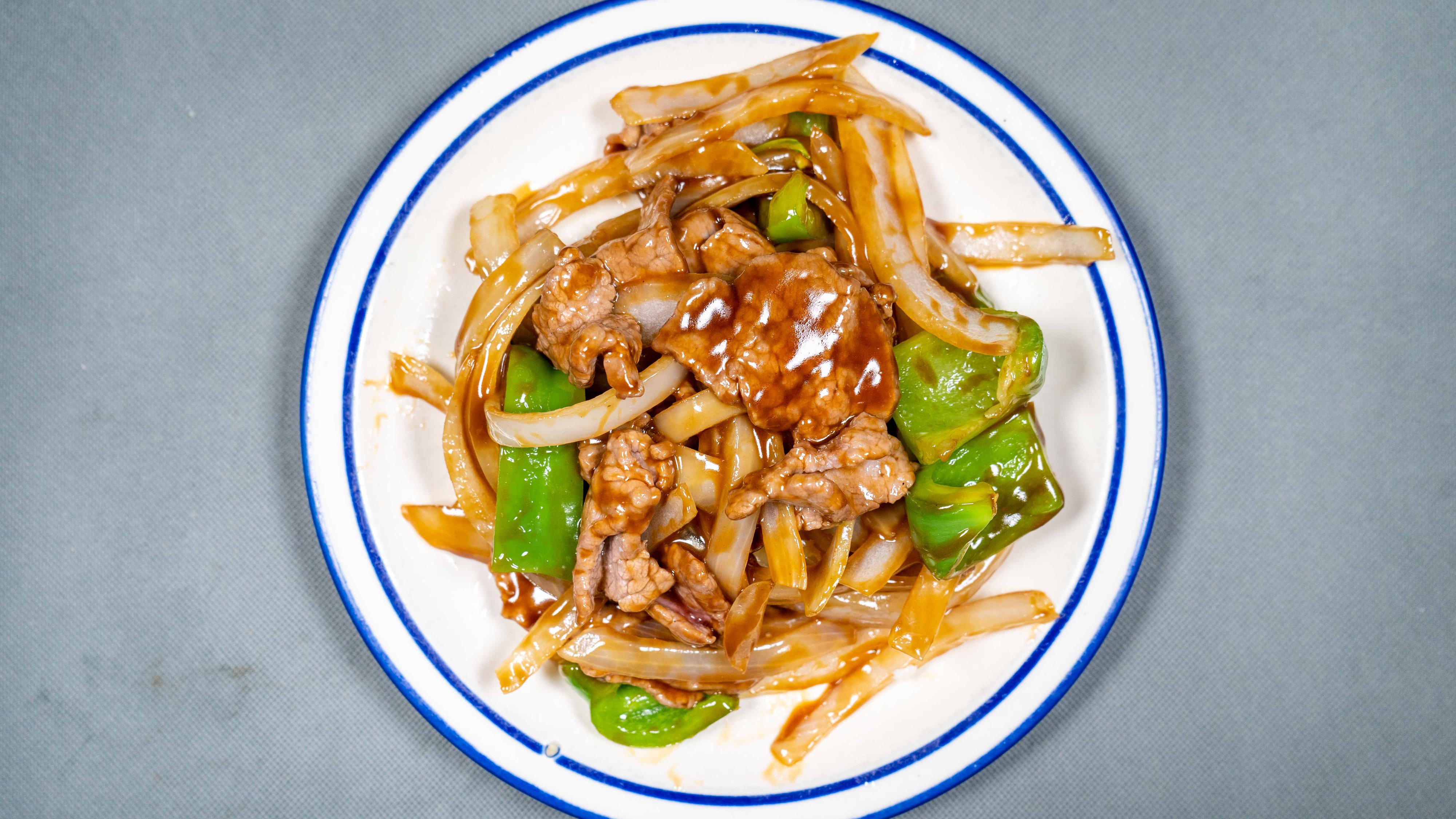 B4. Pepper Steak with Onion