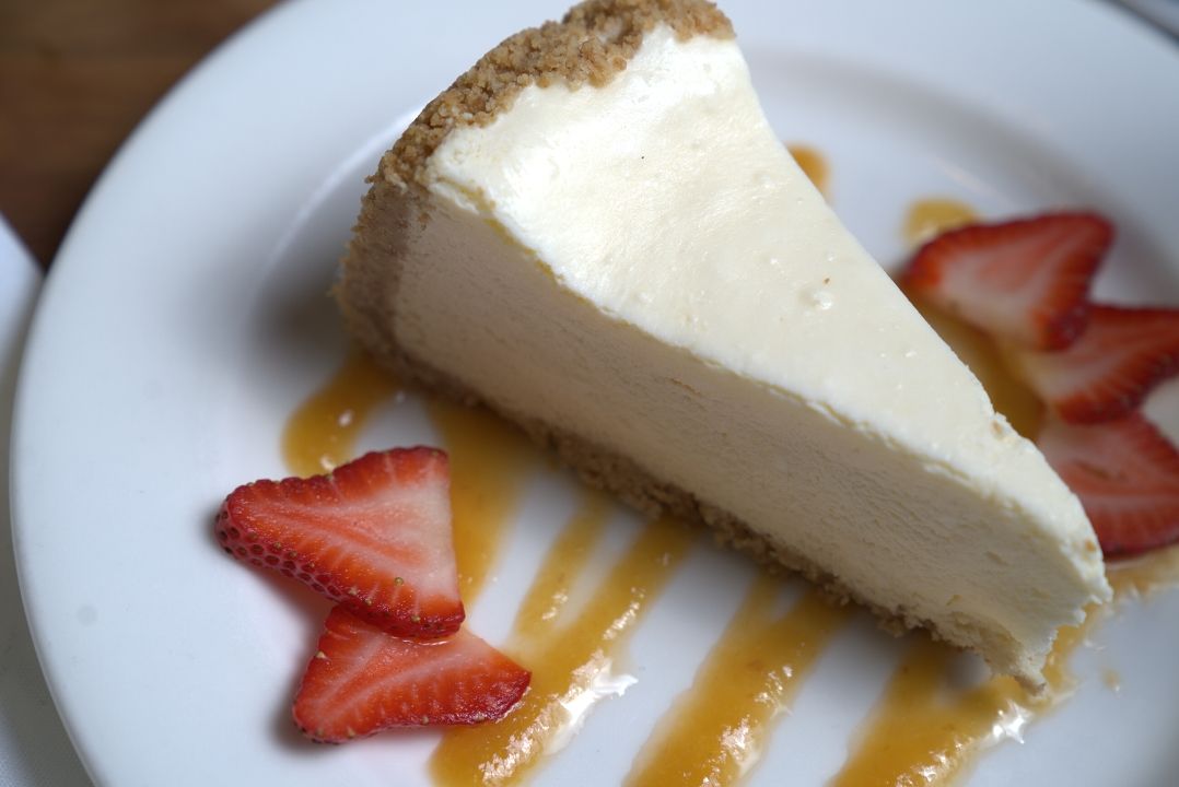 Cheesecake w/Peach Puree