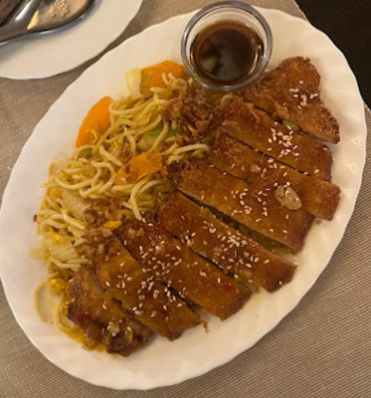 29. Tempura fried pork served with wok egg noodle