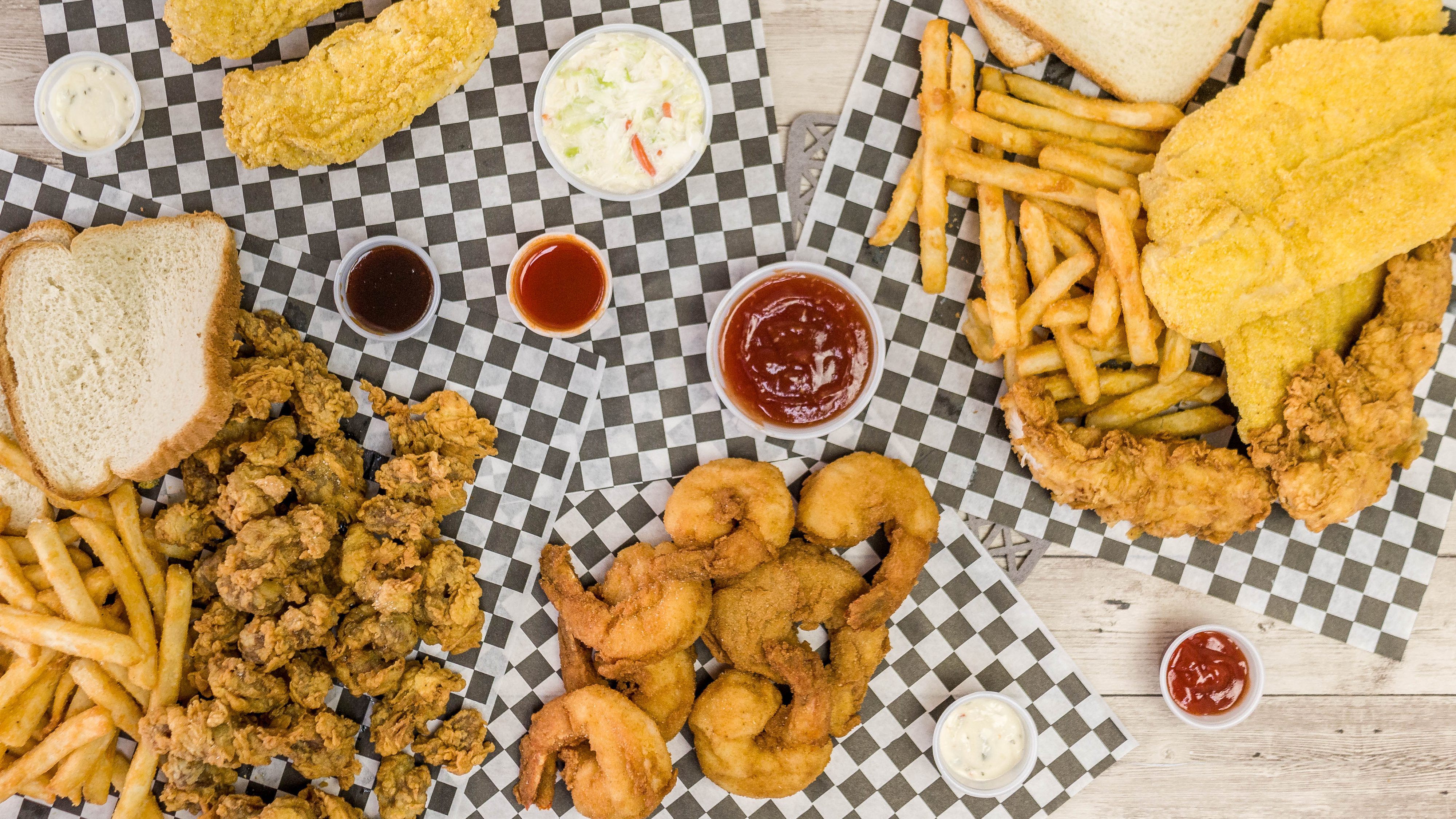 4. 1 Pc. Catfish and 3 Wings and 10 Shrimp with Fries and Drink