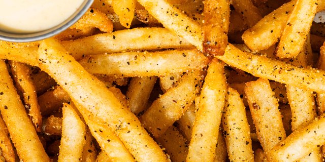 Cosmik Fries w/ Cheese Sauce