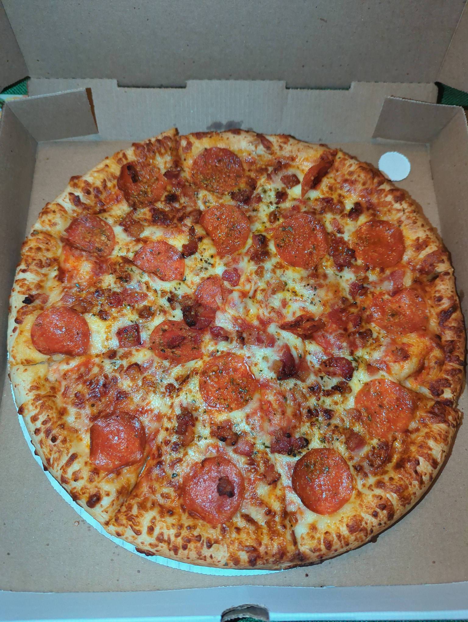 Pepperoni and bacon  pizza