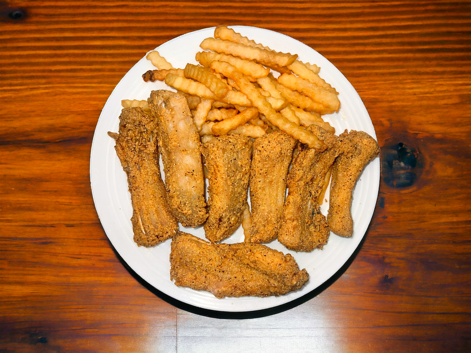 (Catfish Steak, Perch, Whiting, Buffalo Fish) served with Fries