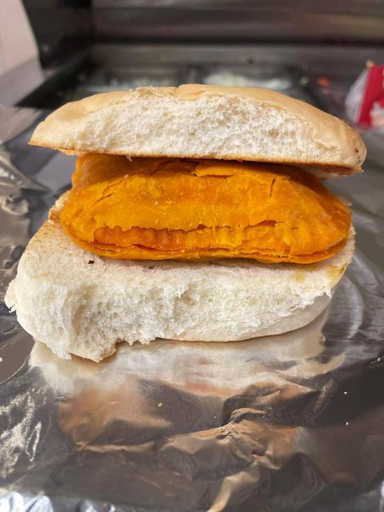 Beef patty on coco bread with ff and soda