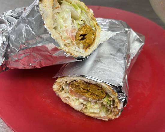 Kabob roll on pita bread with fries and soda