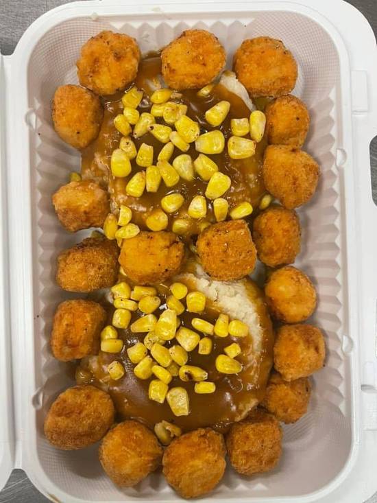 Shredded fried chicken over Mash and Mac