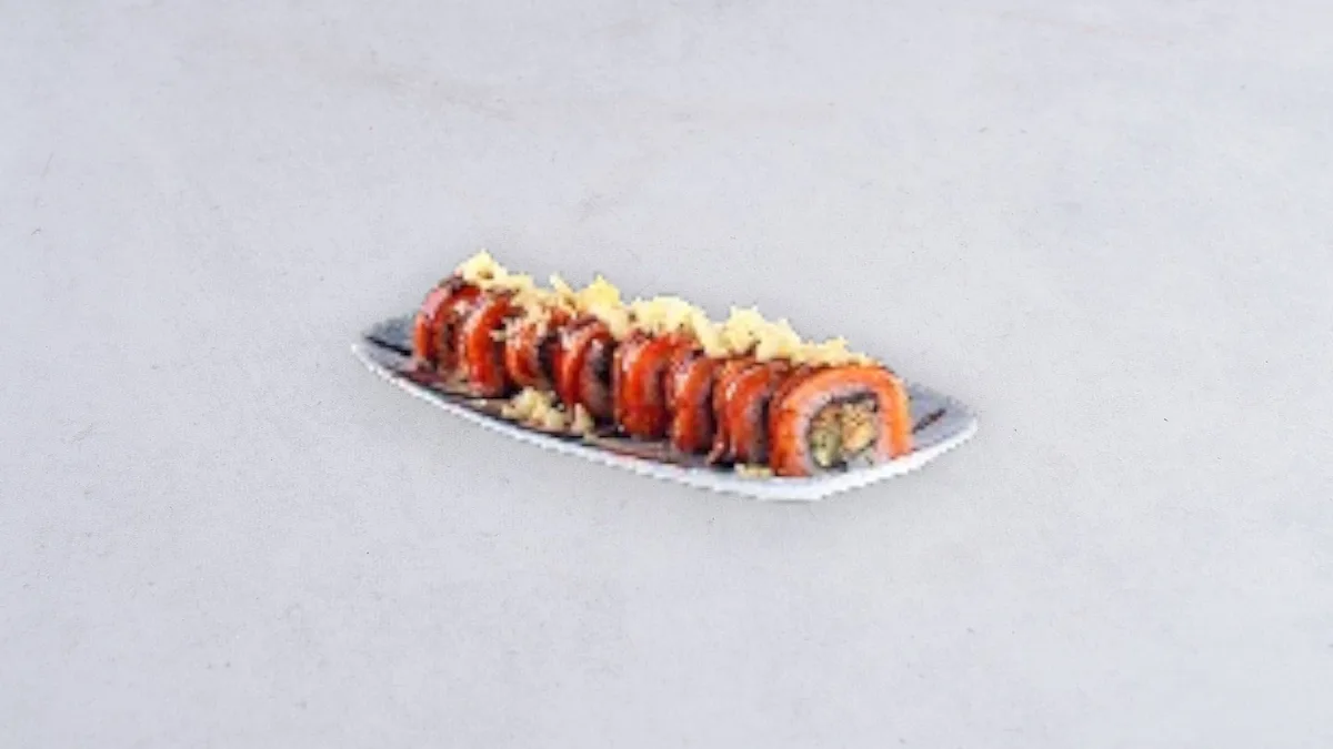 Uramaki z opalanym łososiem teriyaki i węgorzem w tempurze
