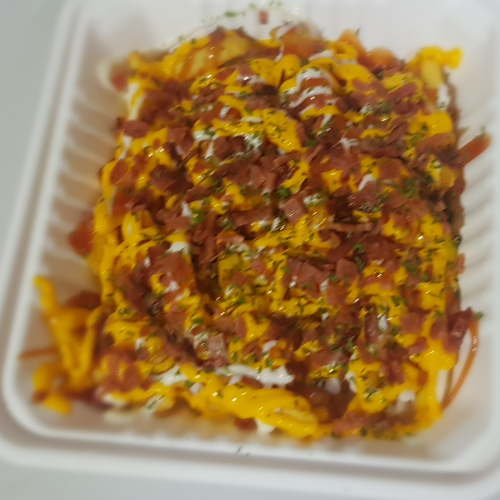 Papas con Tocineta + Te Frio