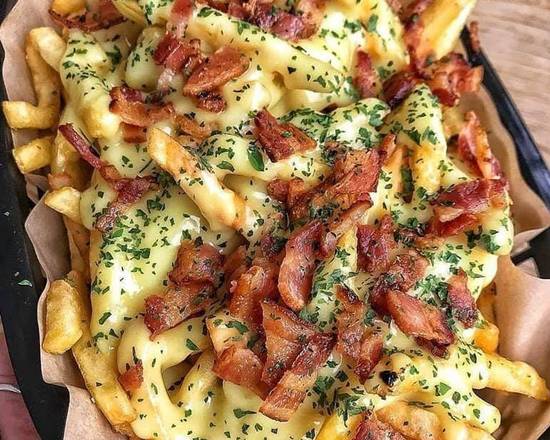 Papas con Tocineta