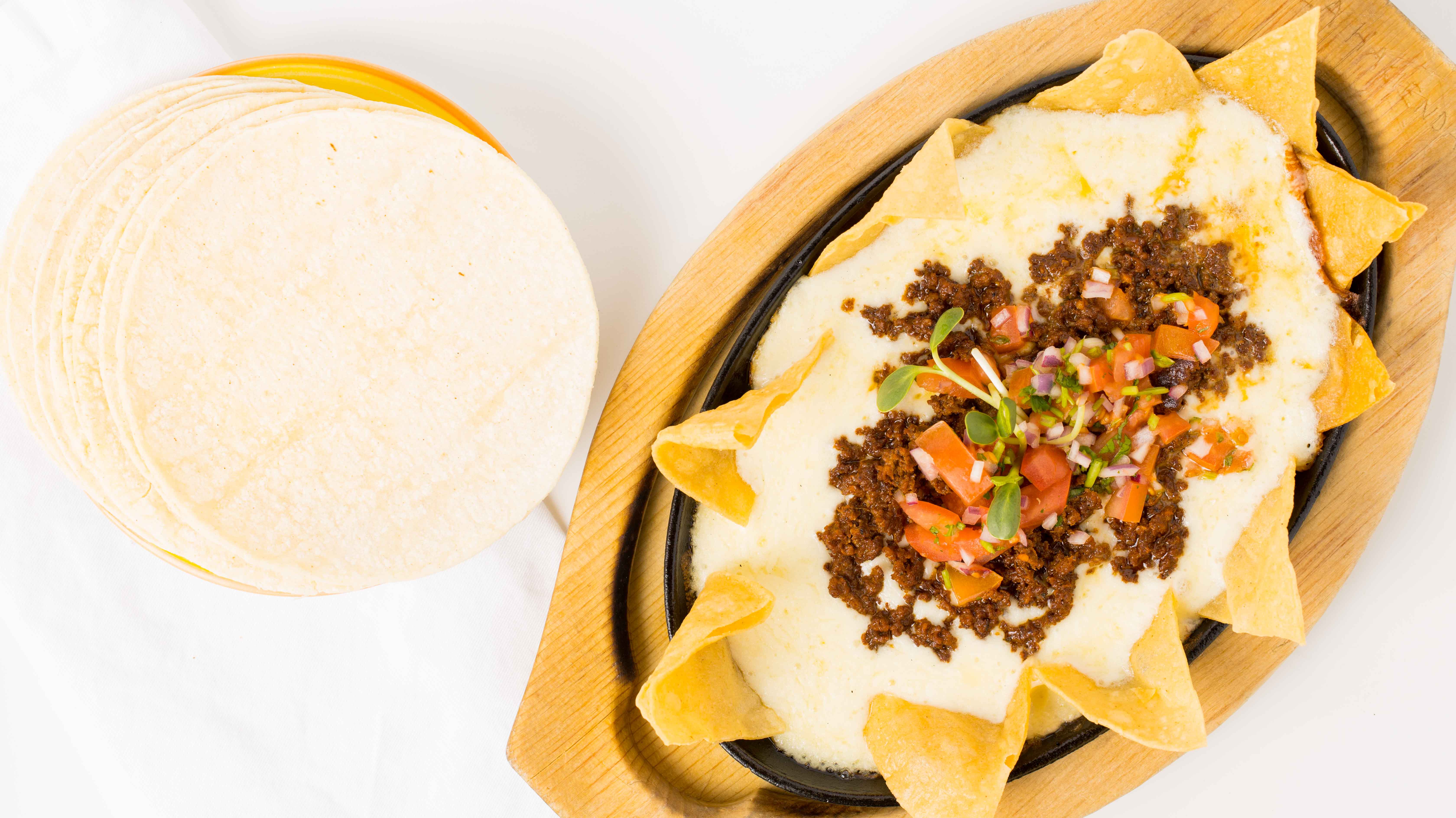 Queso fundido with ground beef