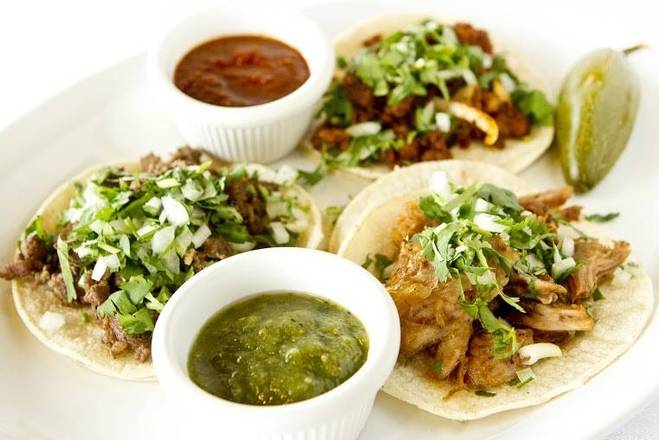 three Tacos only onions and cilantro (Populares)