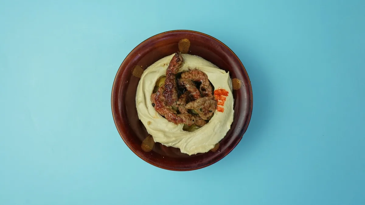 23. Hommus bil Lahme
