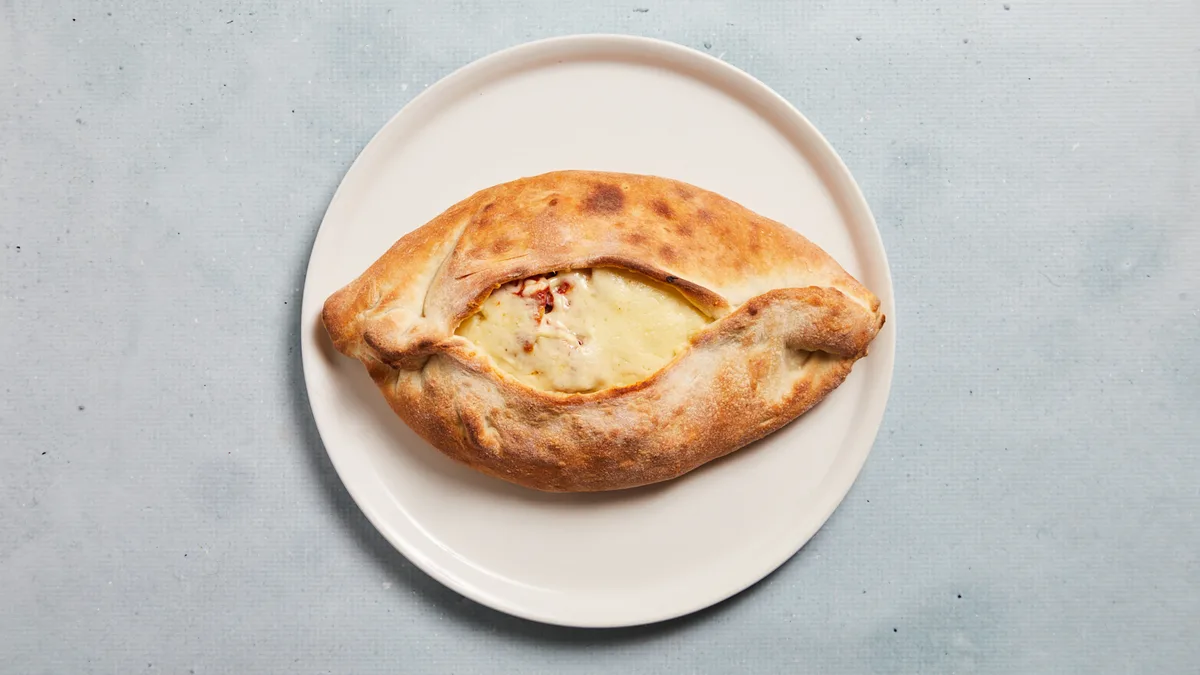 33. Indbagt pizza