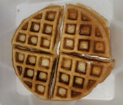 Belgium Waffle with strawberries and whipped cream