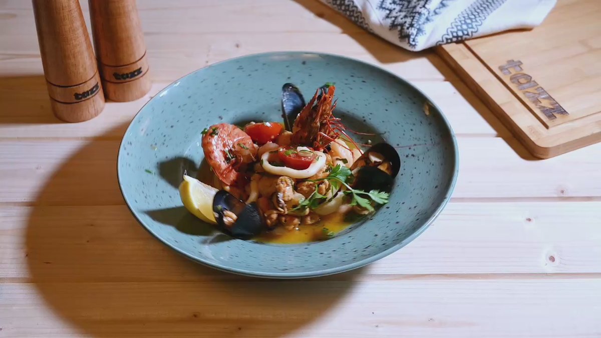 Fructe de mare in sos de vin