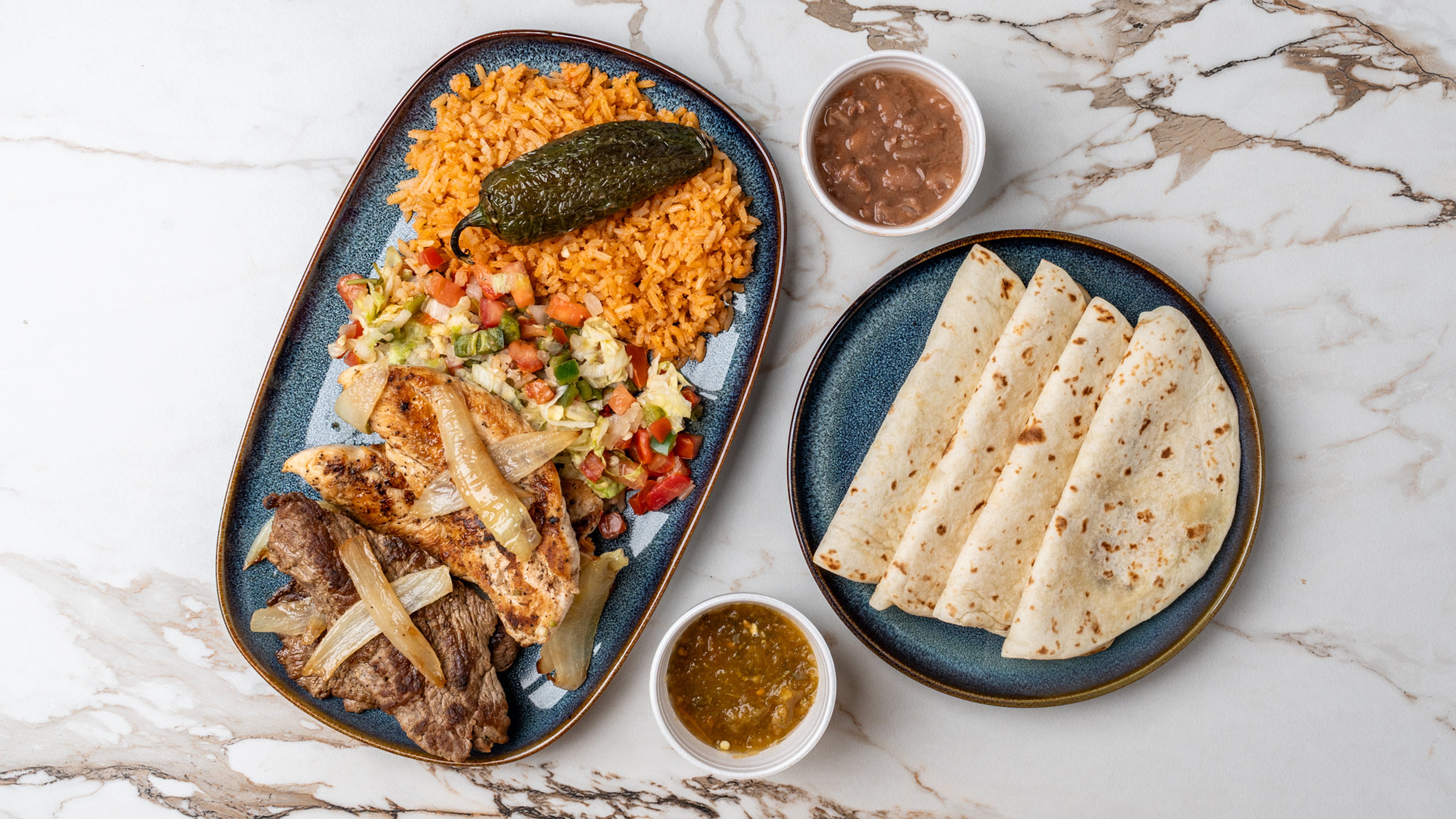 CARNE Y POLLO ASADA