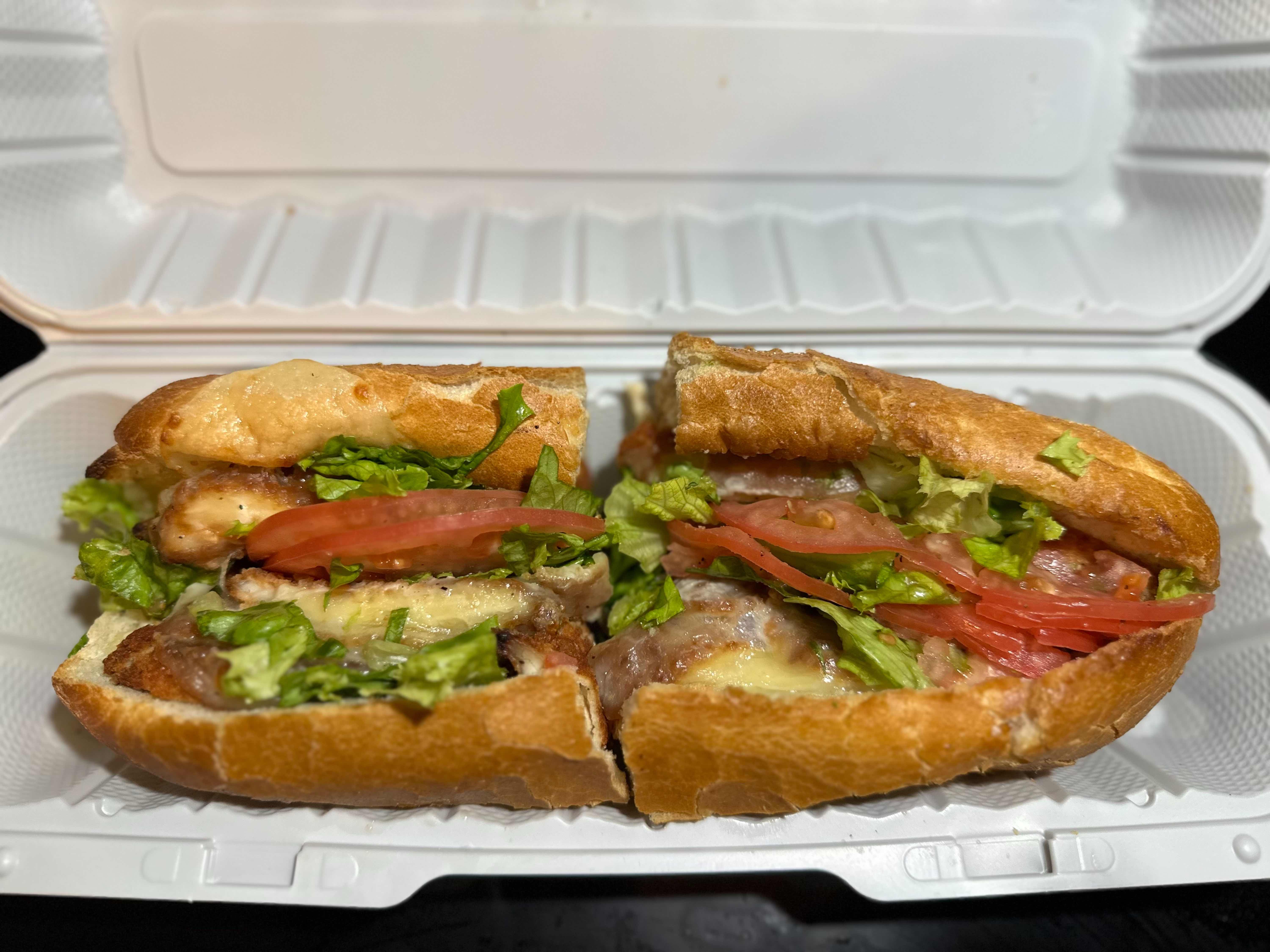 Breaded Chicken lettuce, tomato, mayo and provolone cheese (Grinder)