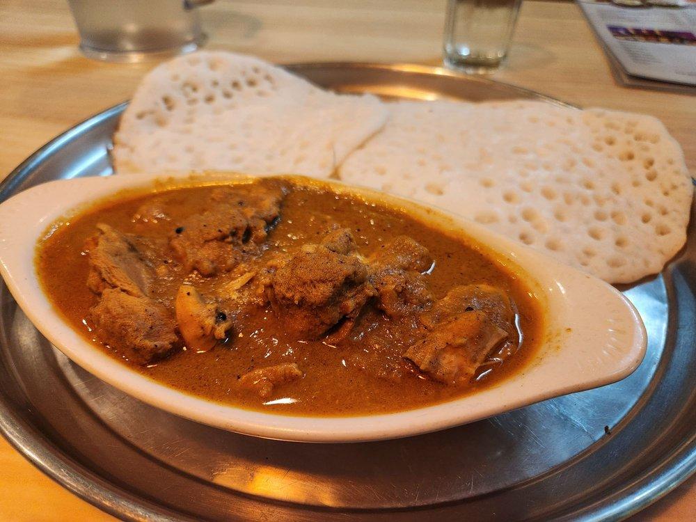 Kerala Special Appam with Chicken Curry