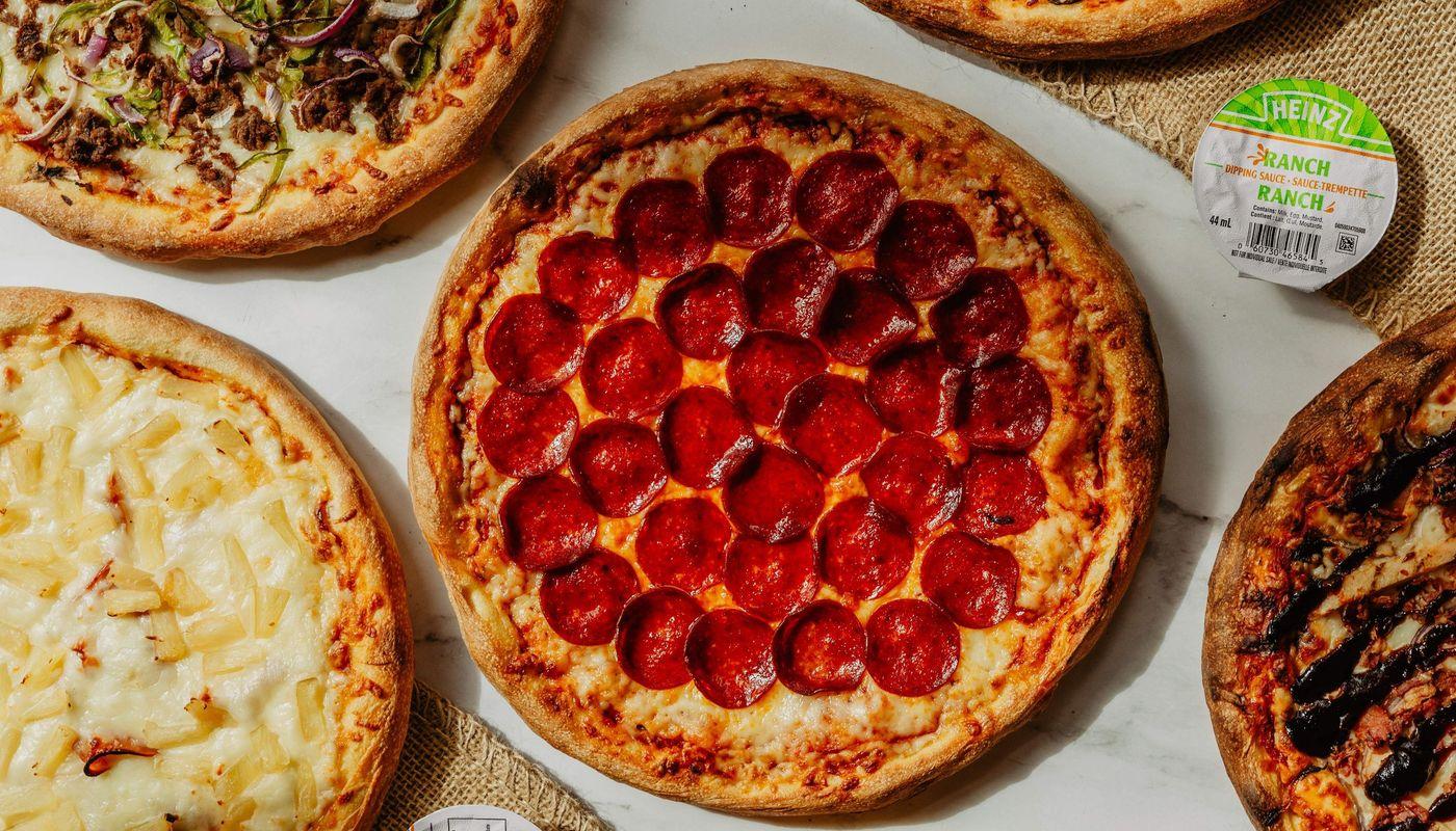 2 Moyennes Pizzas / 2 Medium Pizzas