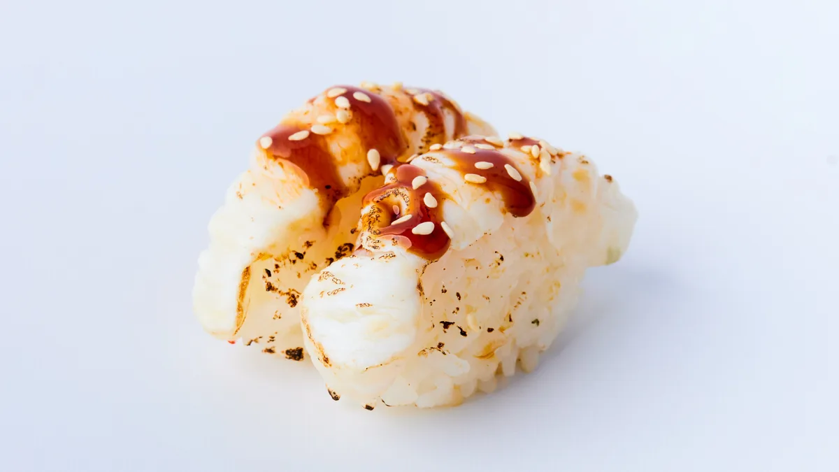 Kveite Aburi (lett flambert nigiri - 2 biter)