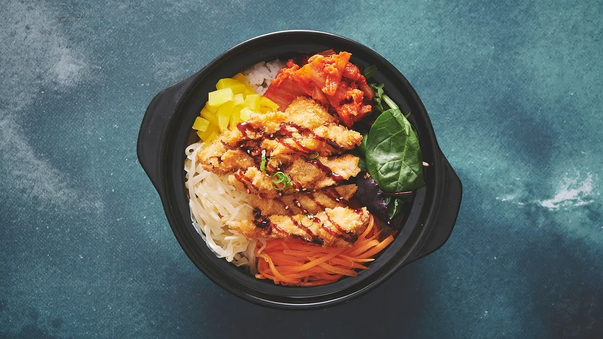 Fried duck noodle bowl