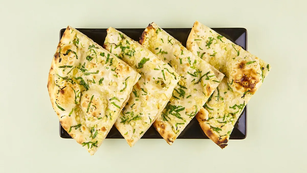 56. Garlic Naan