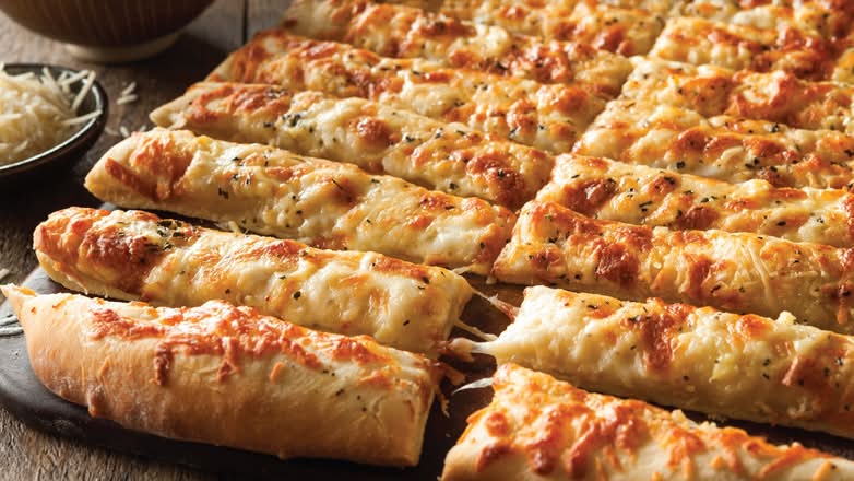 4 Cheesy Stix and 1 Dip