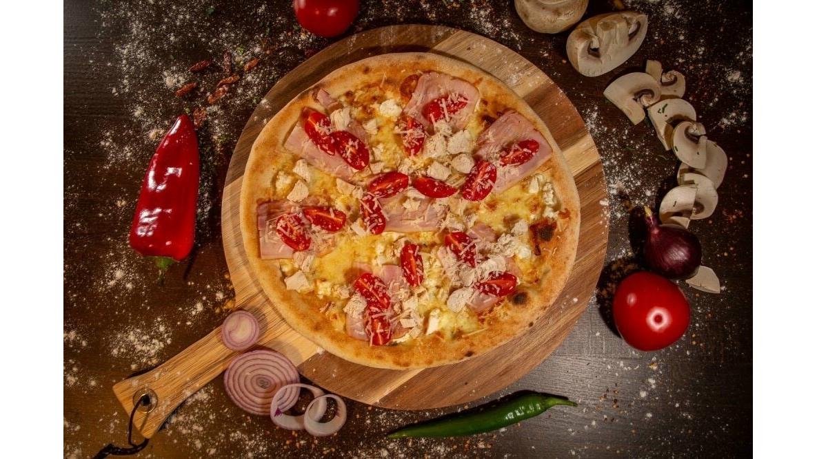 Pizza specialitatea pizzarului