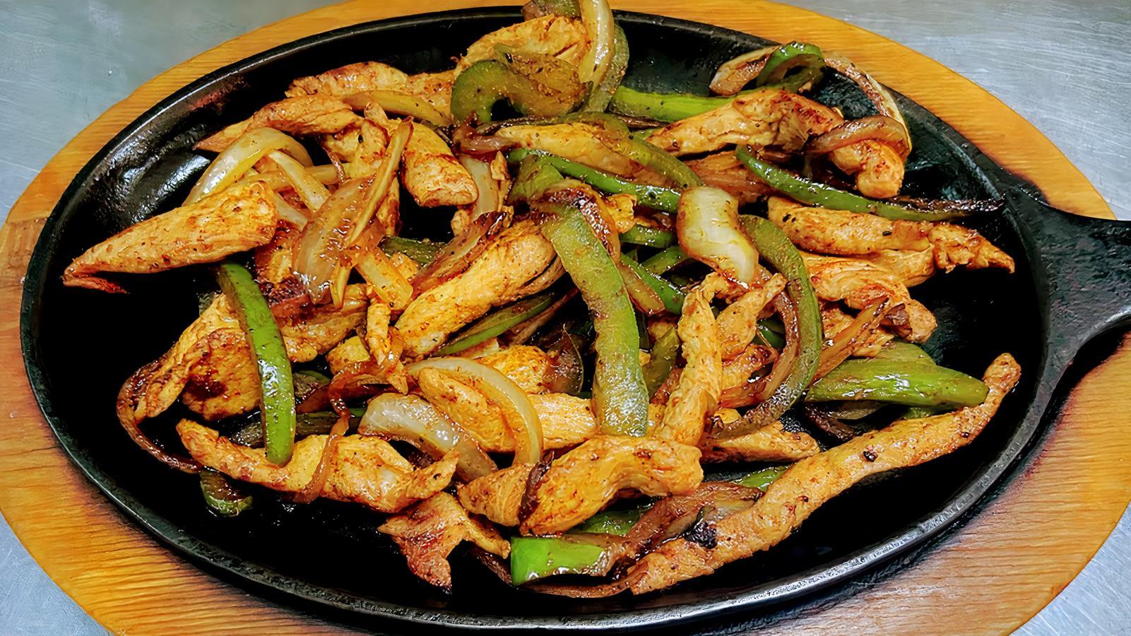 34. Steak or Chicken Fajitas