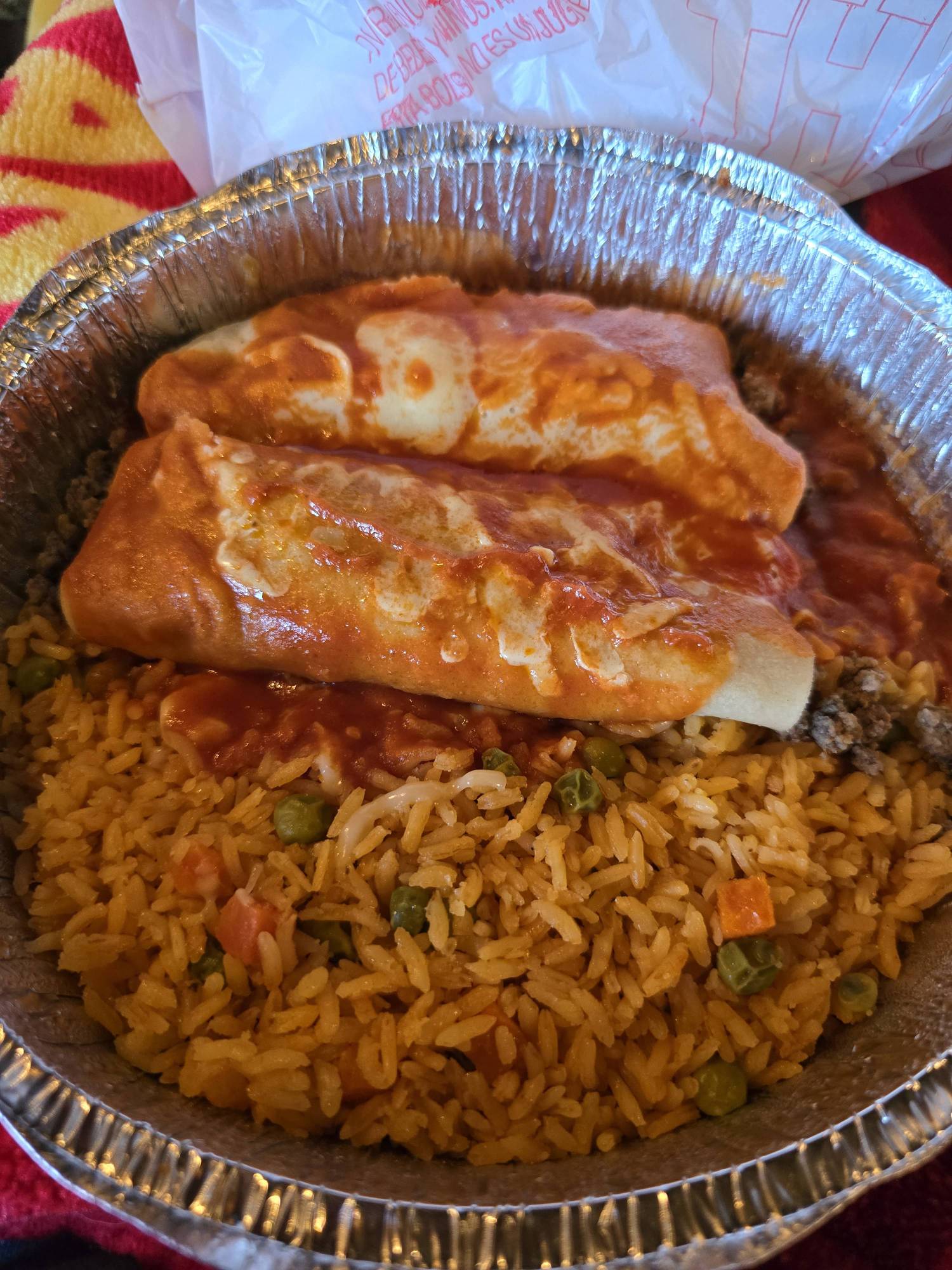 1. Two Enchiladas, Taco, Rice or Beans