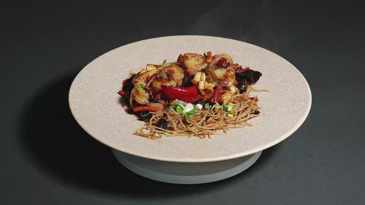 Noodle box cu fructe de mare în sos cu arome