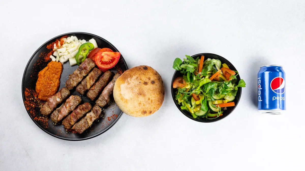 Cevapi with bacon (8 pieces), salad and Pepsi 0.33 l