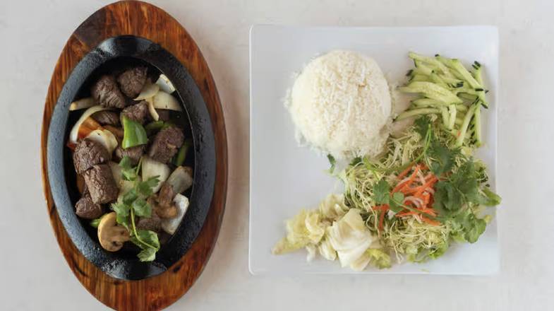 Diced Filet Mignon and Onions on Sizzling Plate with Rice (Cơm Bò Lúc Lắc)