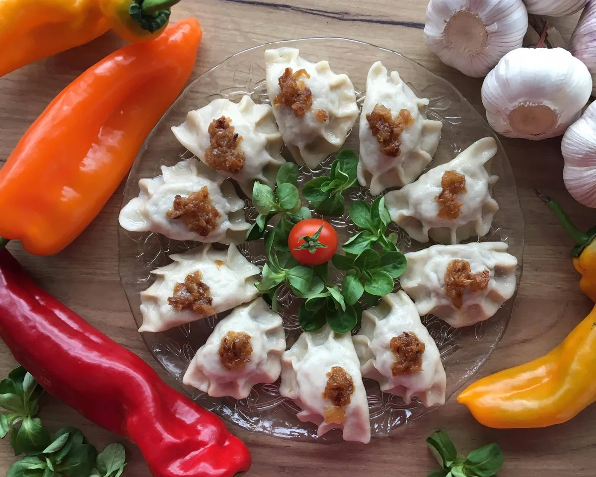 Pierogi z cielęciną (8 szt.) z okrasą z cebuli