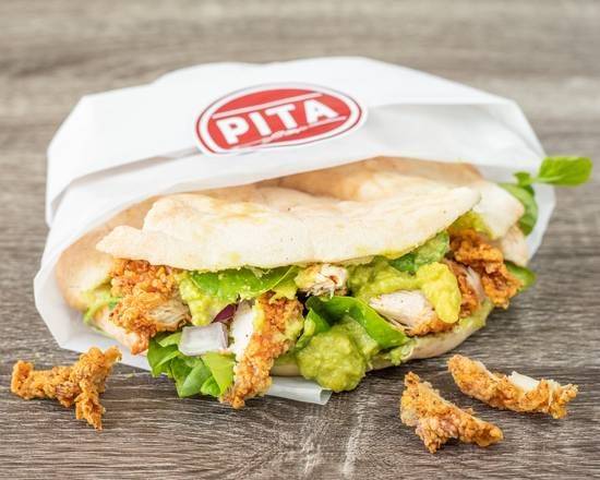 Crispy chicken and guacamole pita