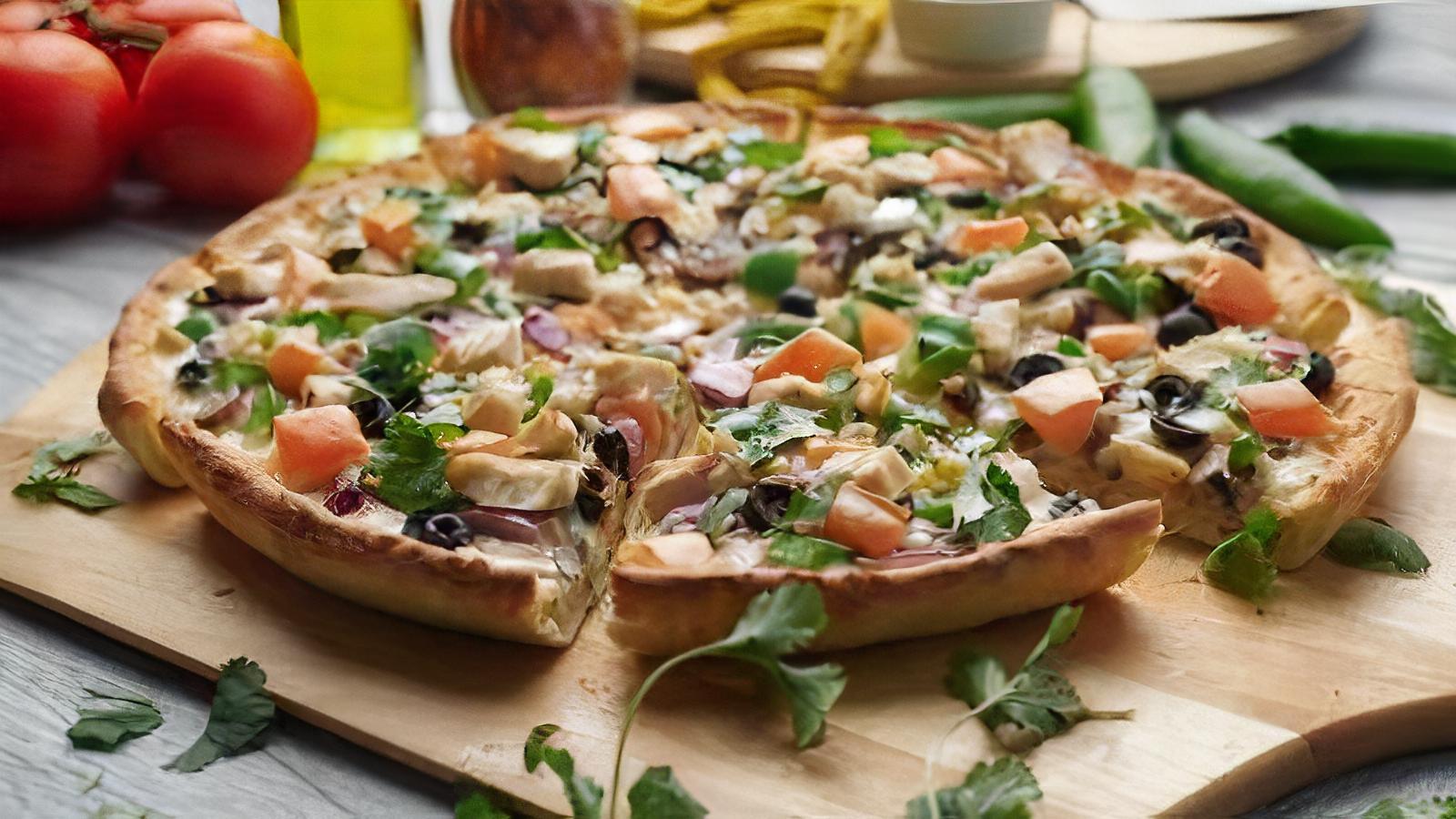 Plant-Based Bombay Garlic Chicken Pizza Twist
