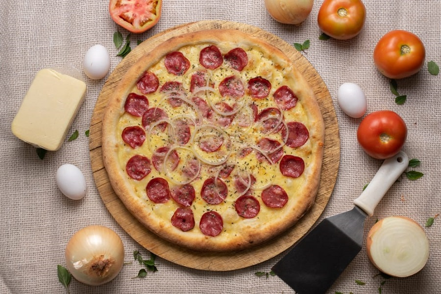 Combo 2 Pizzas Gigantes + Kuat 2L - 8 Fatias