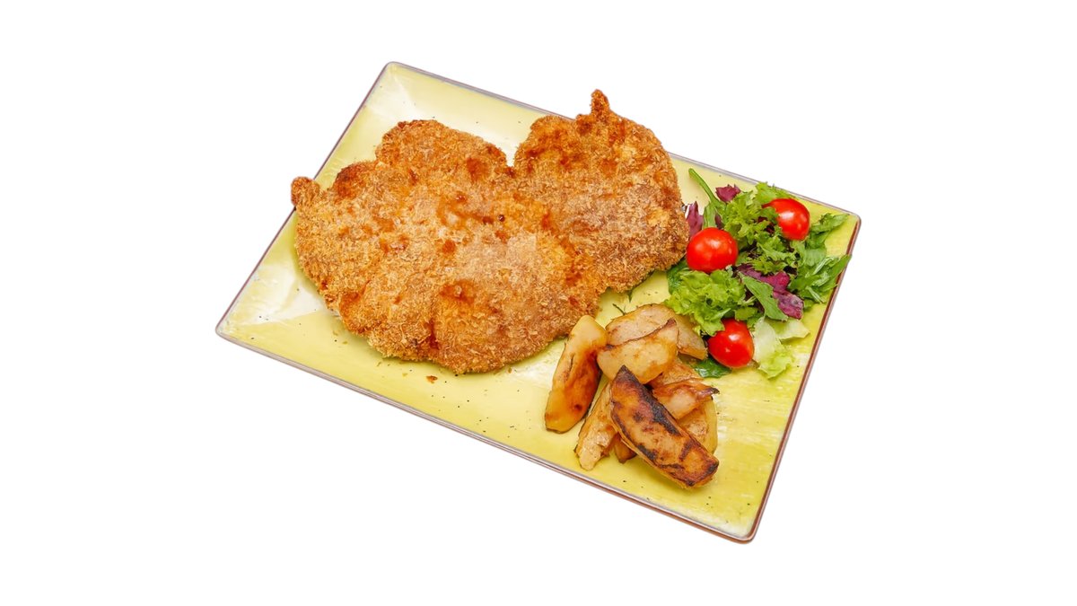 Cotoletta di vitello con patate al forno e rosmarino