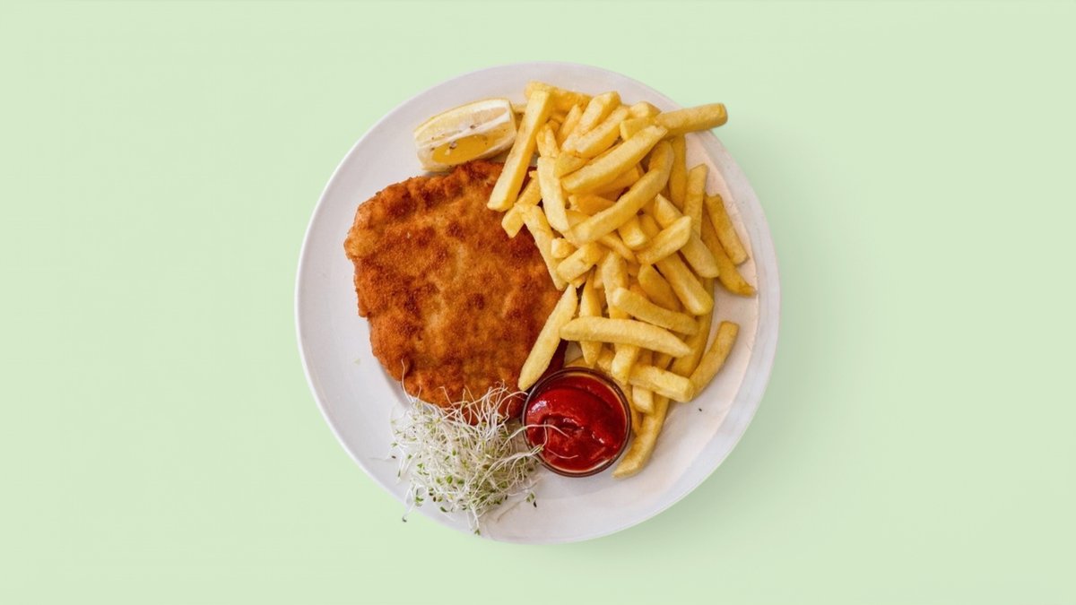 Paniertes Schnitzel mit Pommes frites