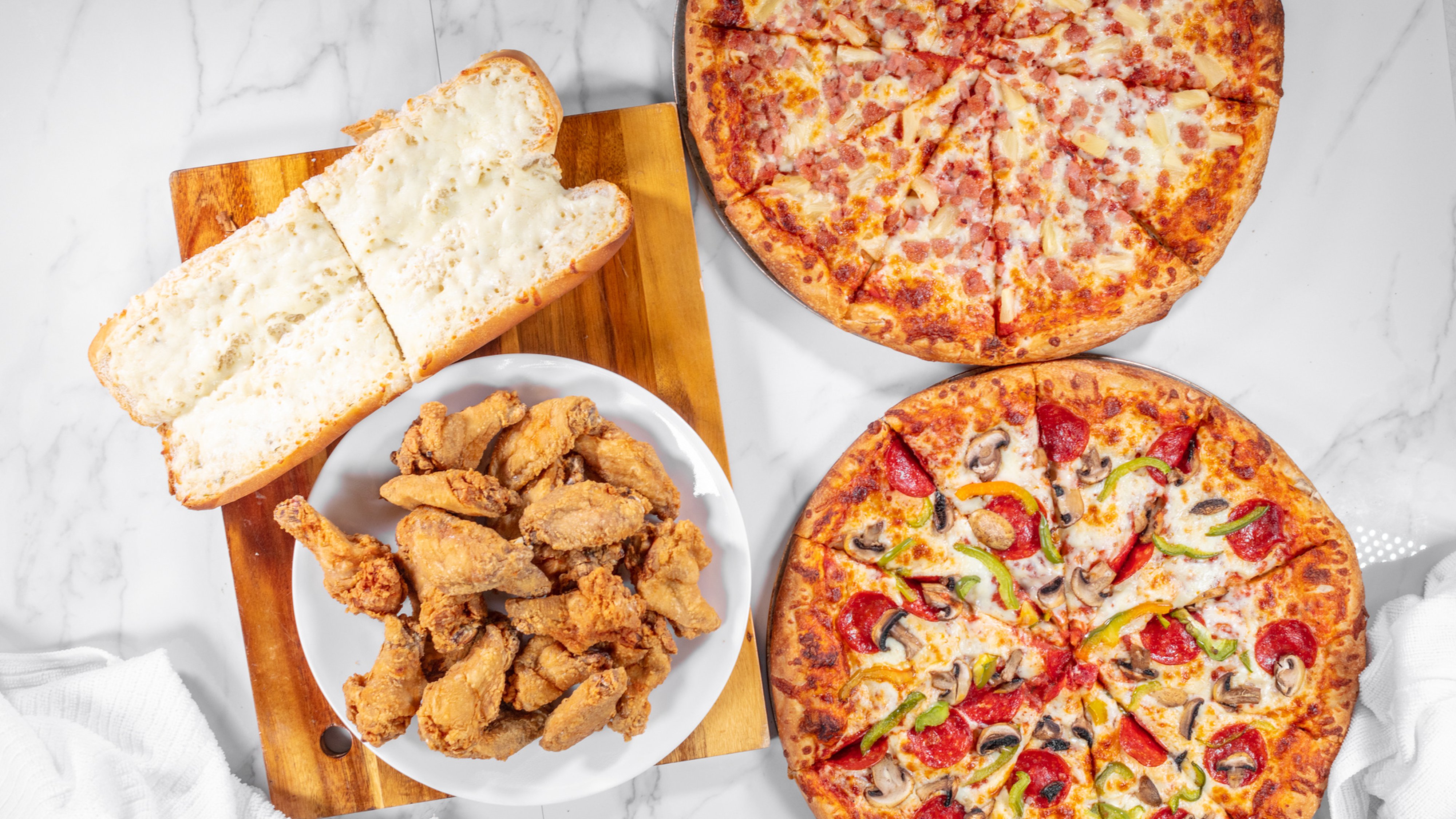 5B- 2 Large Pizzas and 20 Wings
