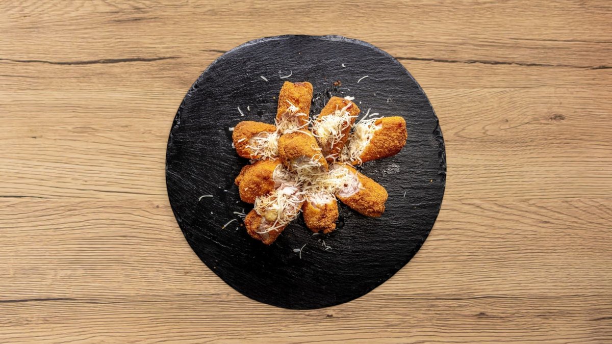 Sajttal és sonkával töltött sertéskaraj rántva 0,5 kg