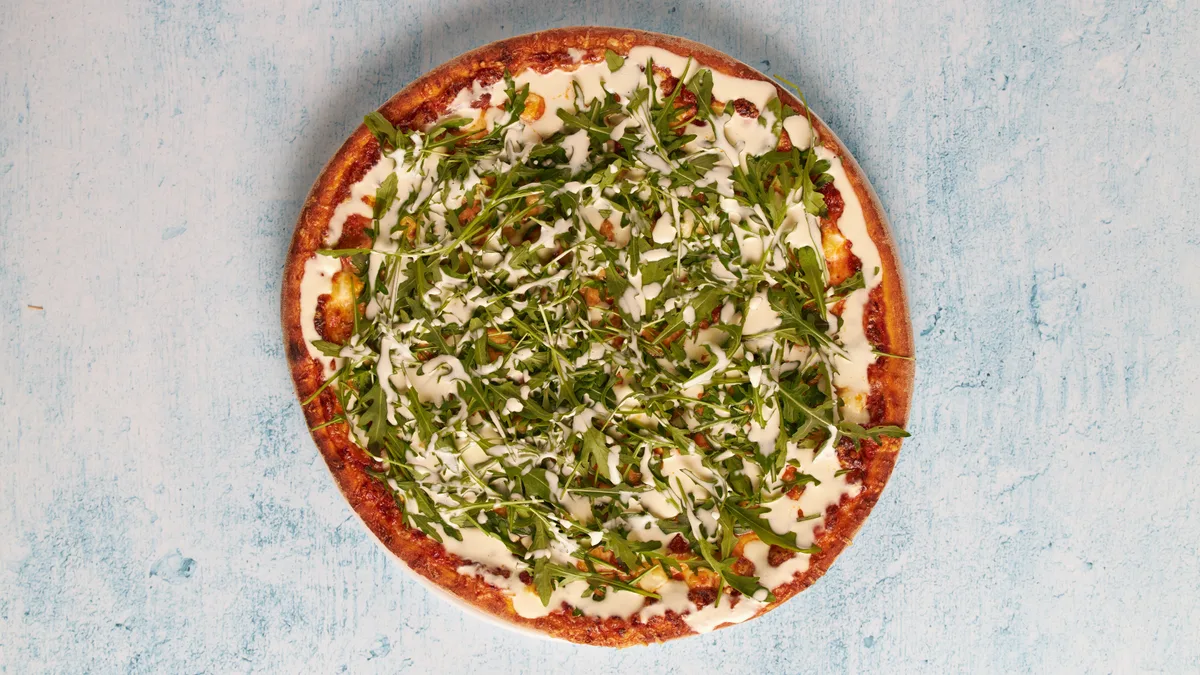 23. Neljän Juuston Pizza