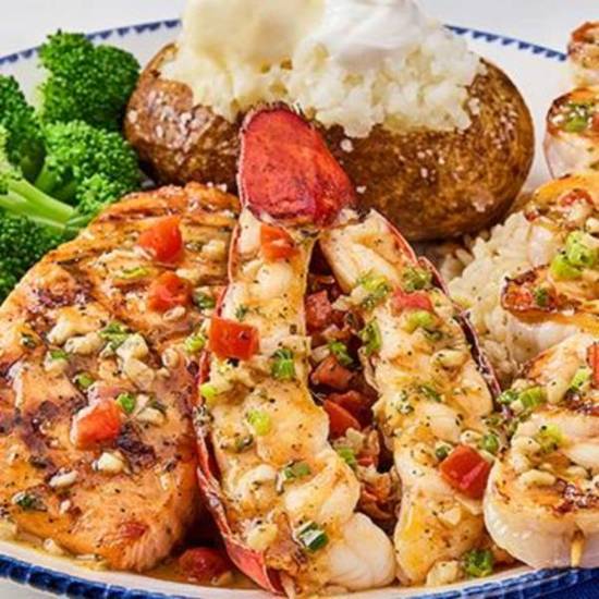 Grilled Lobster, Shrimp and Salmon** (Signature Feasts)