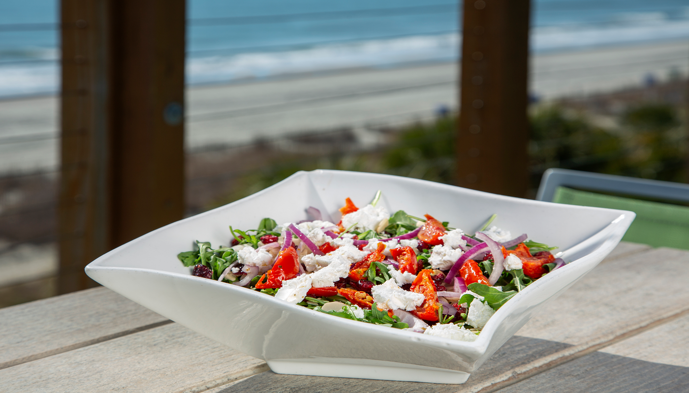 BABY ARUGULA, TOASTED ALMONDS and  DRIED CRANBERRY SALAD