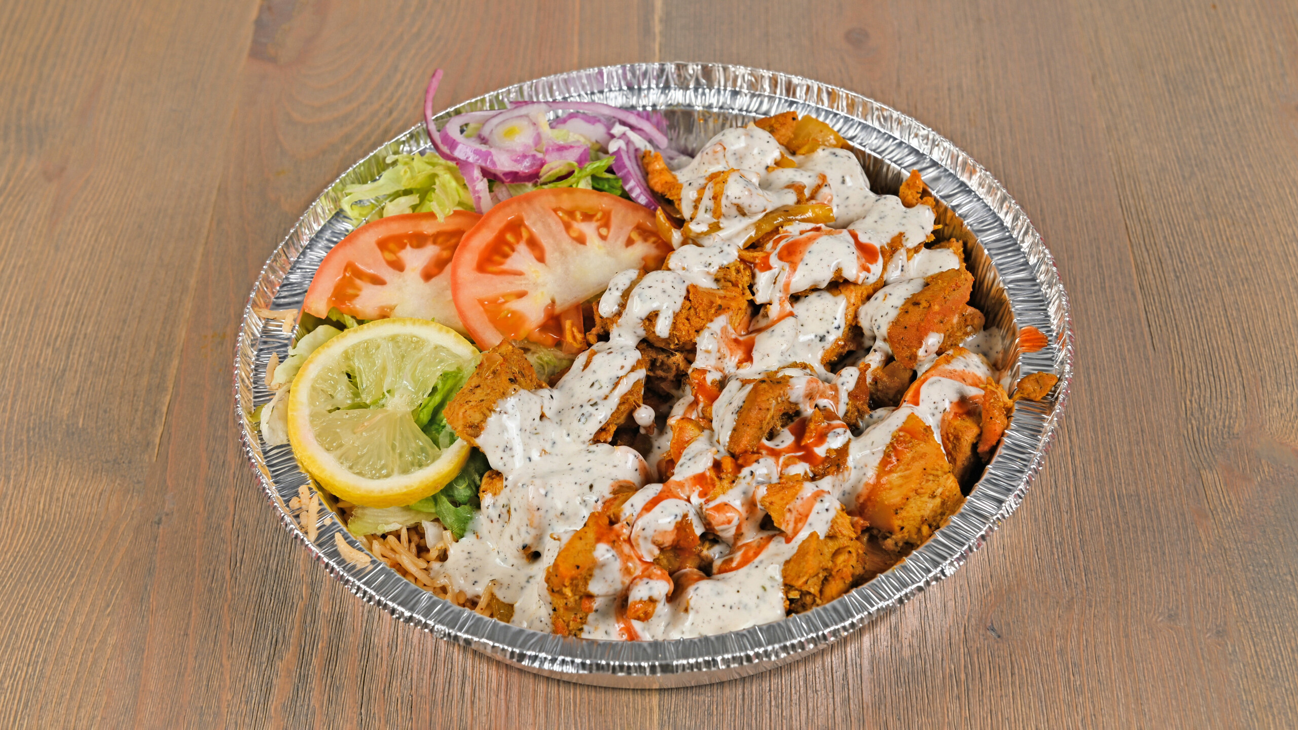 Chicken Over Rice with Salad and Soda