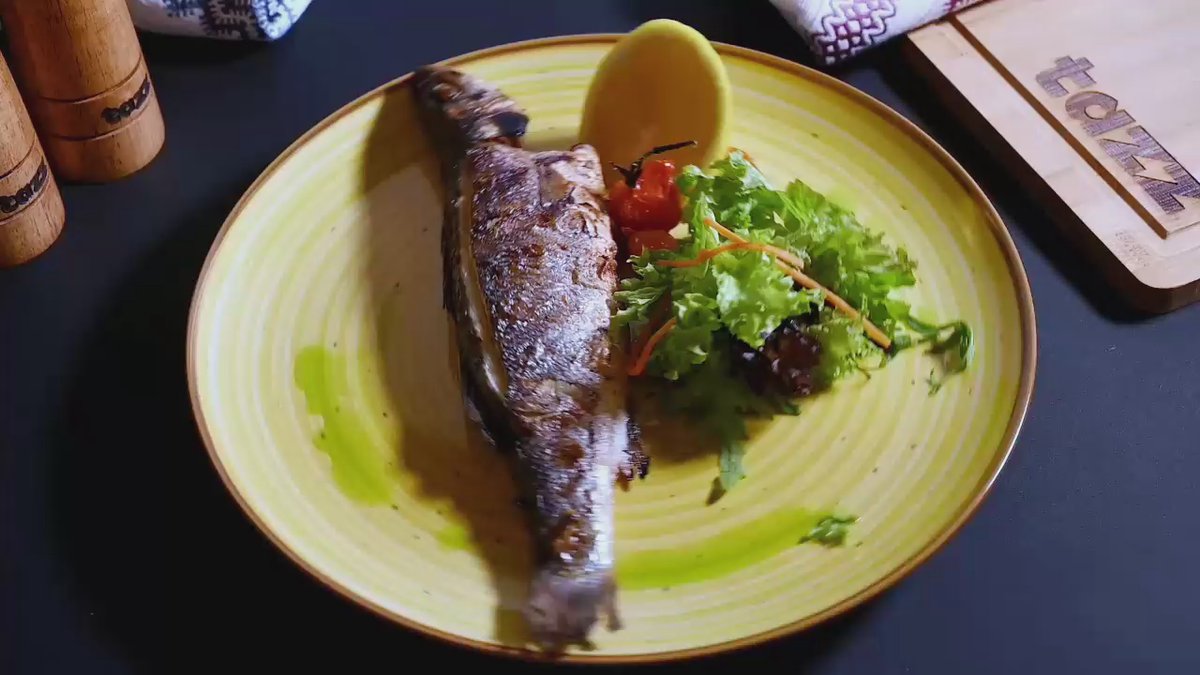 Biban de mare cu salsa de roșii